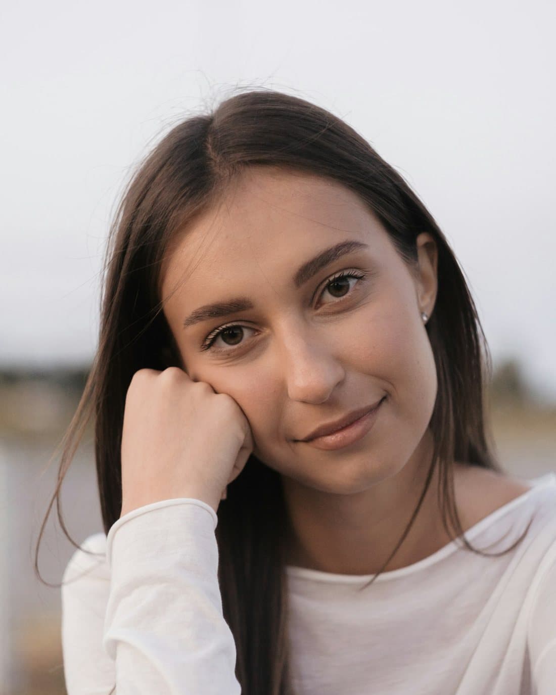 A young adult looking calmly at the camera, representing teen and young adult therapy in Newington, CT
